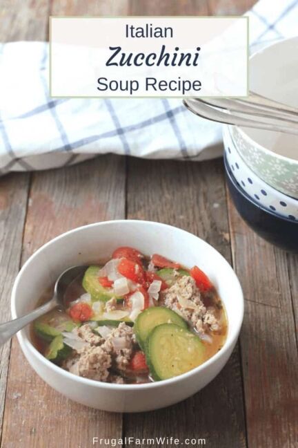 Picture shows a white bowl of zucchini soup on a table, with text that reads "Italian Zucchini Soup Recipe"